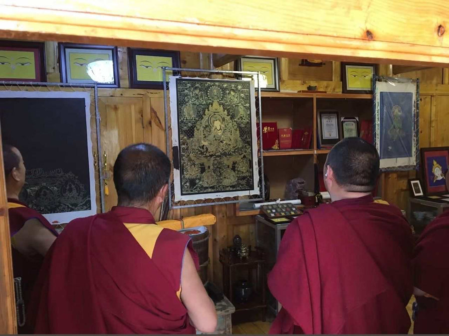 Tibetan lama empowering a Thangka pendant Thangka Pendants Are Empowered
