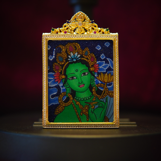 Hand-painted Green Tara Thangka Pendant with gold accents, symbolizing spiritual protection and serenity.