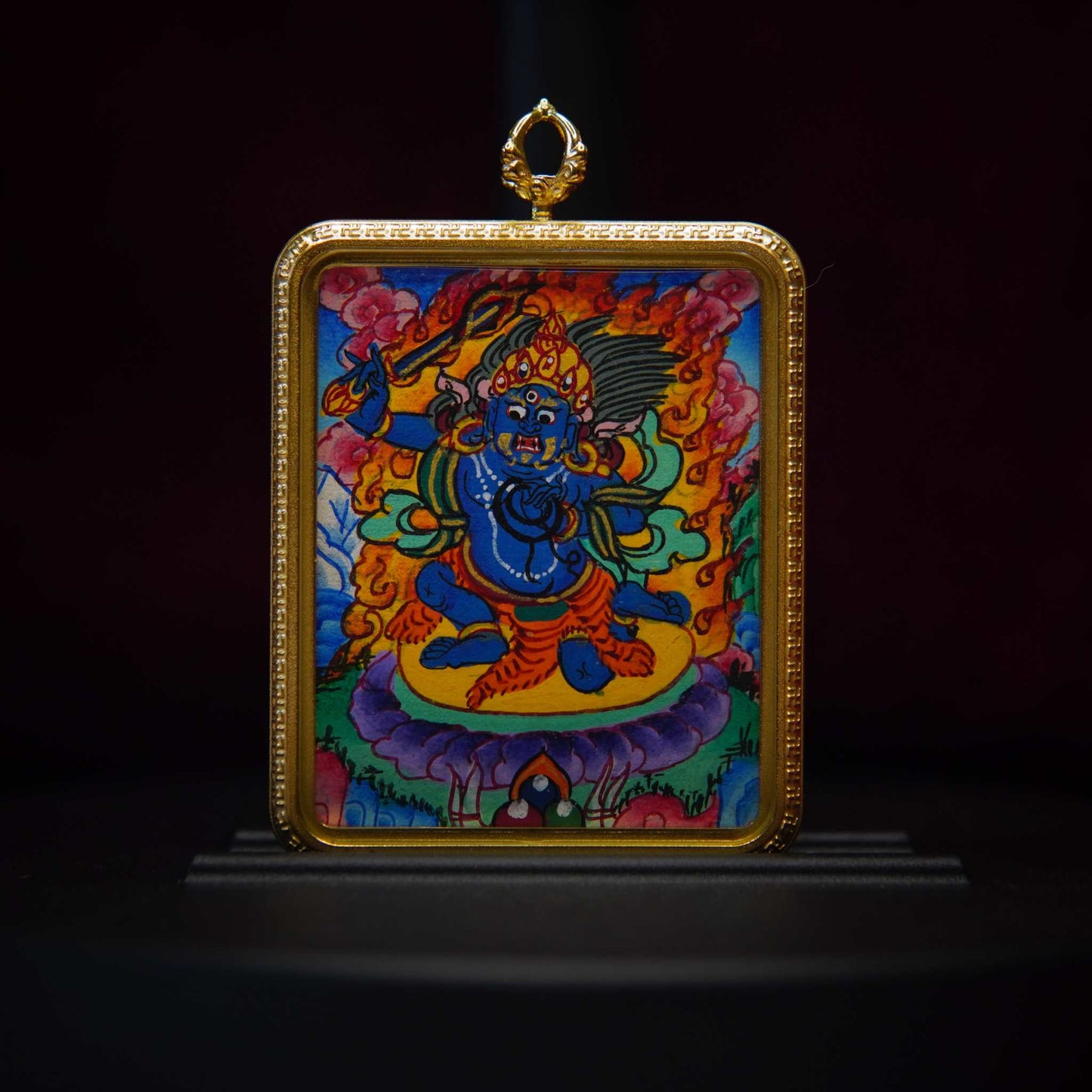 Hand-painted Acala necklace pendant showcasing the fierce Buddhist Wisdom King amulet, crafted with traditional Tibetan artistry.