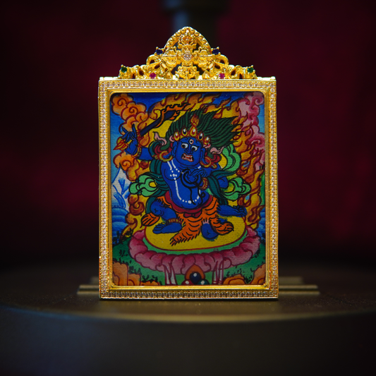 Acalanatha Vidyaraja Thangka Pendant Necklace with gold-plated border, featuring fierce blue deity and fiery crown.