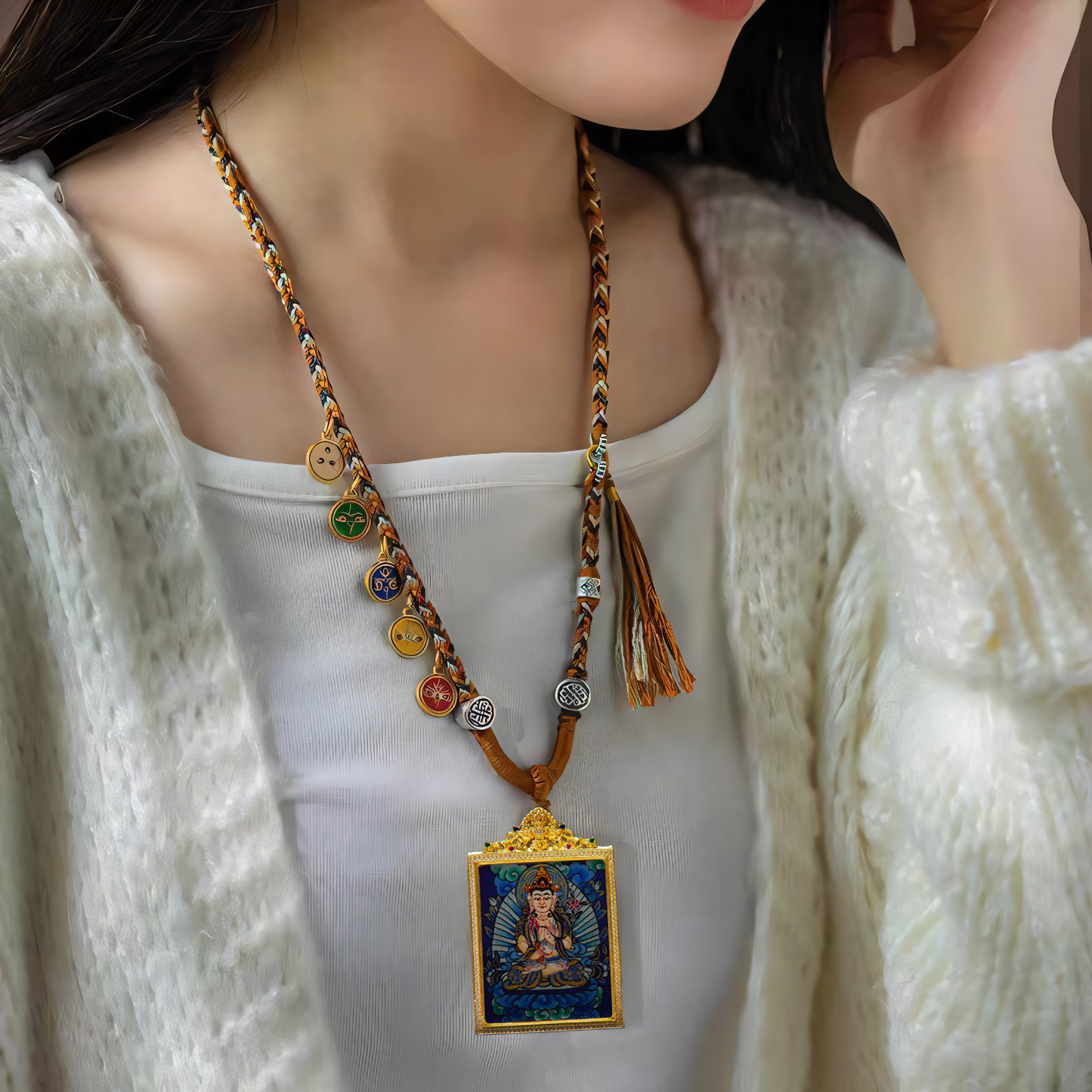 Akasagarbha Bodhisattva Thangka Pendant Necklace on woman's neck, featuring detailed hand-painted design with cosmic and sacred symbols.