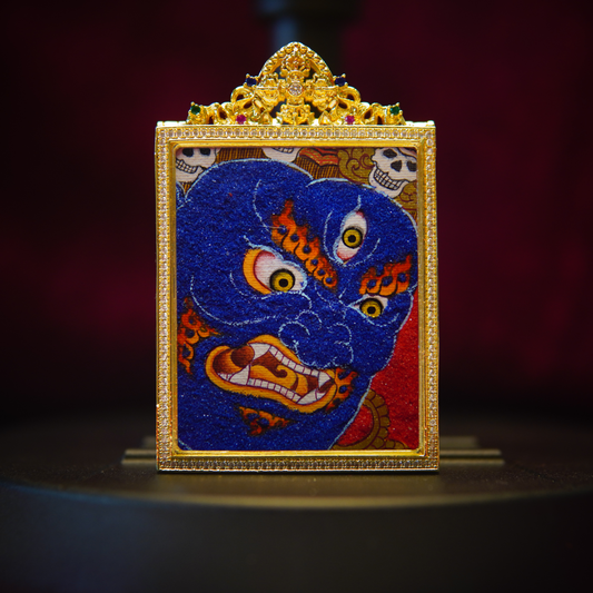 Mahakala Buddhist Pendant Necklace with blue deity, skull crown, golden flames, and Tibetan scrollwork.