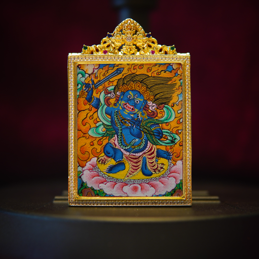 Handcrafted Acala Buddha Necklace with lapis blue pendant, featuring intricate designs of Acala on a lotus, symbolizing protection and courage.