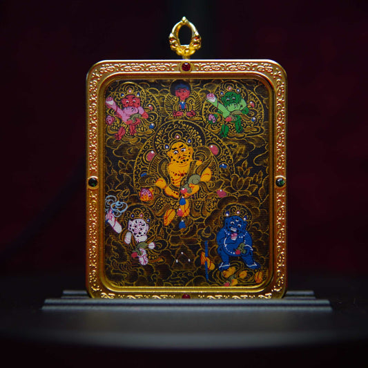 Six-Road God of Wealth Thangka Pendant Necklace with vibrant deities on a dark background, encased in an intricately patterned gold frame, symbolizing Tibetan good fortune and protection.