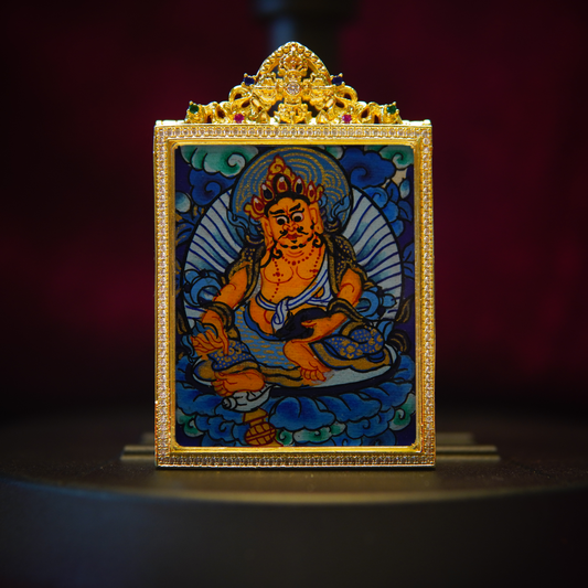 Yellow Jambhala Thangka Pendant featuring Buddhist Wealth Deity in a hand-painted design with intricate silver frame.