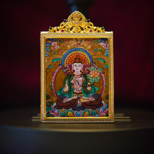 Hand-painted Vajra Wisdom Thangka pendant depicting Mahasthamaprapta Bodhisattva on indigo silk with 24K gold accents, showcasing sapphire-blue skin, gold stupa, and lotus with vajra.