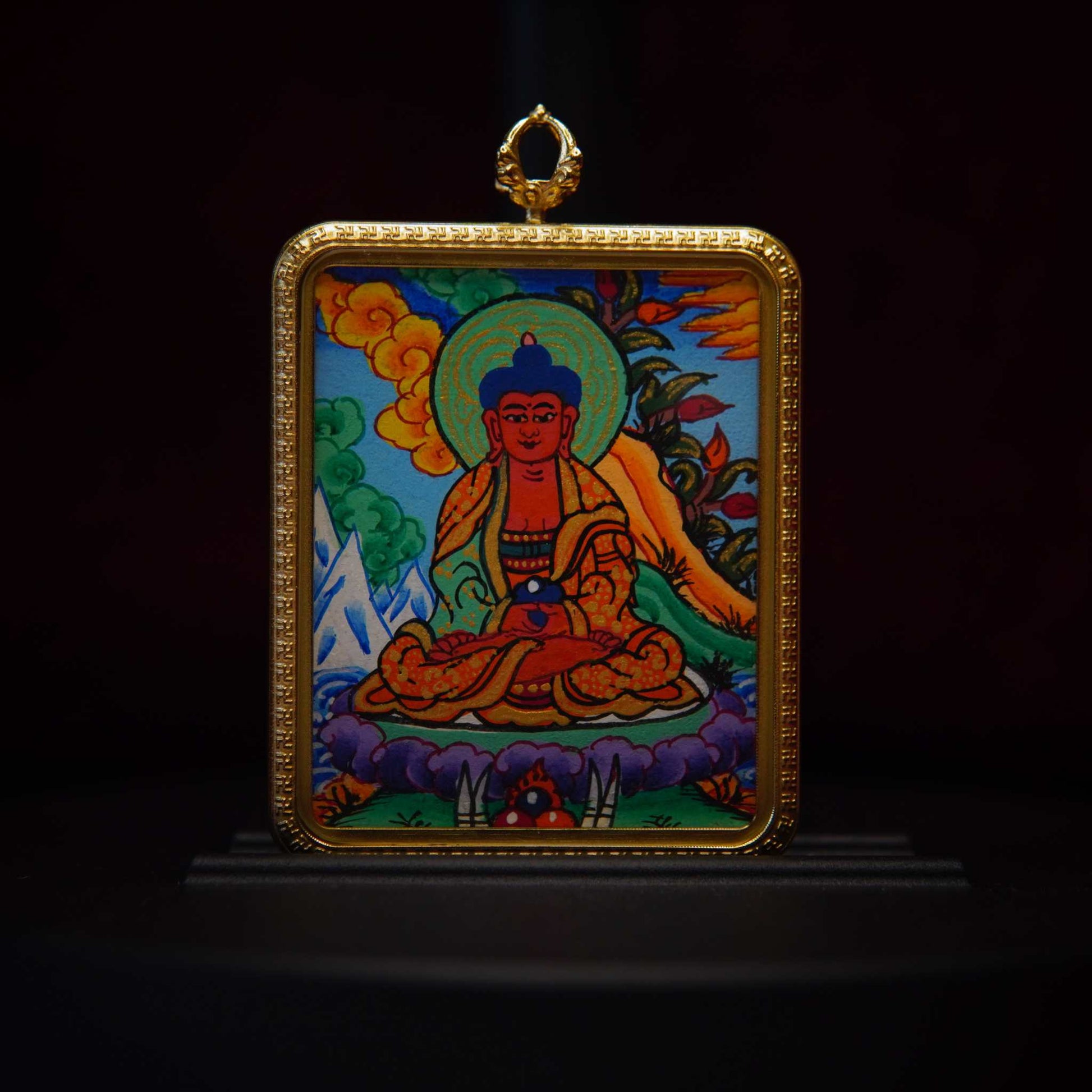 Hand-painted Amitabha Buddha Thangka pendant with serene meditative posture, vibrant colors, and gold detailing for spiritual peace.