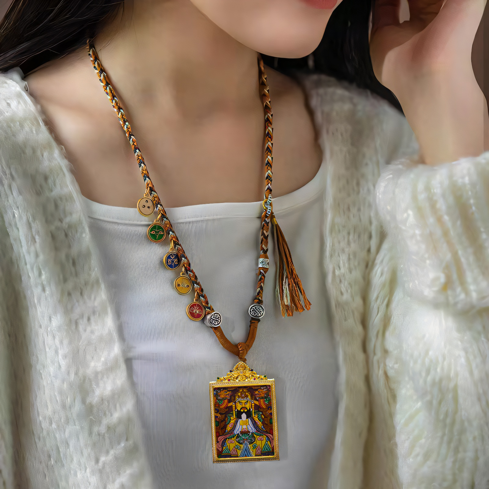 Hand-painted Dragon King Bodhisattva Thangka pendant, Tibetan Buddhist amulet for wealth and protection, worn on a braided necklace with decorative beads.